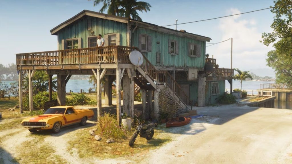 GTA 6 ön sipariş Ultimate Edition bonusu olan, Leonida Keys sularının kenarında direkler üzerine kurulu ahşap güvenli ev mülkü, önündeki sarı klasik kamyonet ve motosiklet