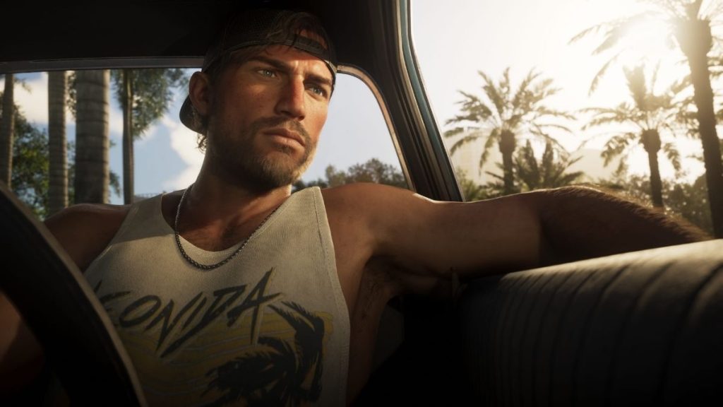 GTA 6 erkek ana karakteri Jason Duval'ın araba içinde direksiyon başında dışarıya doğru baktığı ekran görüntüsü